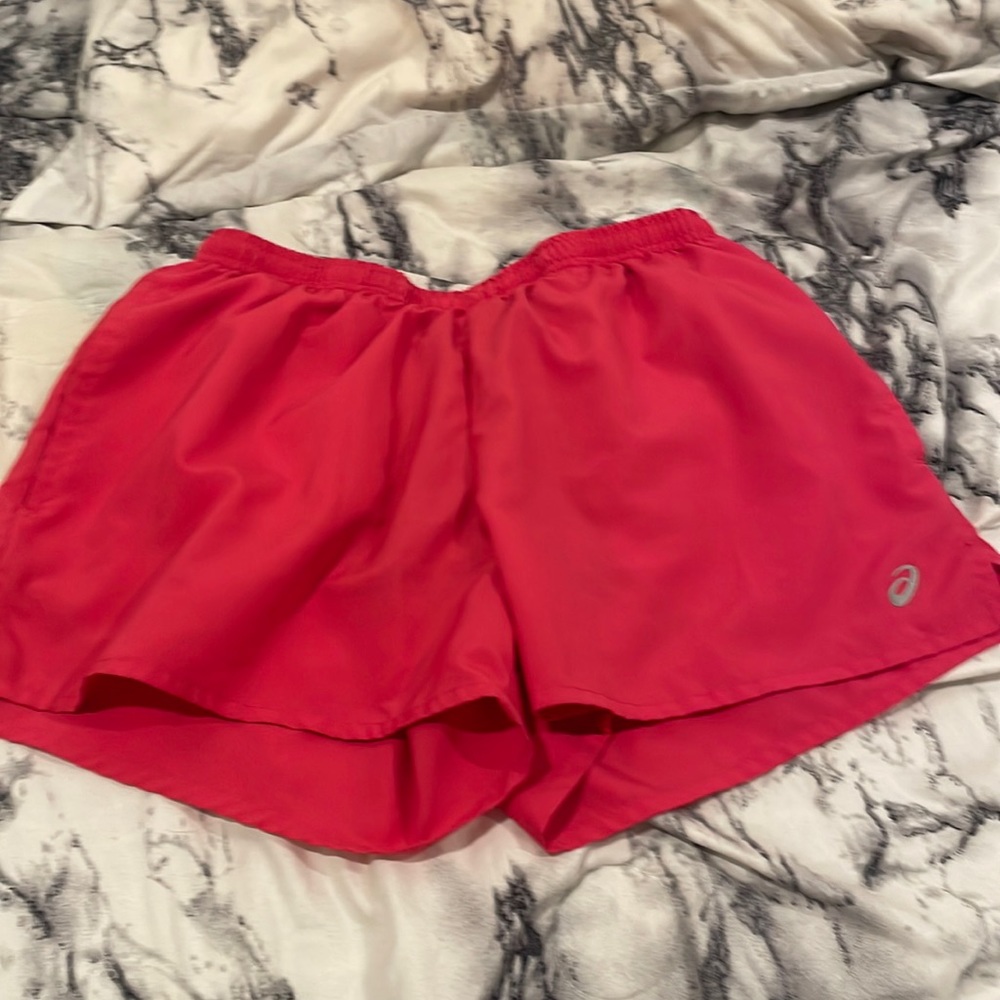 Bright pink running shorts with pockets!